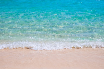 Fototapeta na wymiar Tropical sandy beach and blue sea