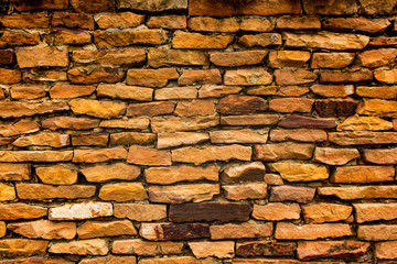 Old stone brick wall background.
