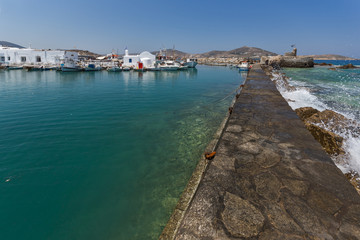 Fototapeta na wymiar Amazing Panorama of Venetian fortress and port in Naoussa town, Paros island, Cyclades, Greece