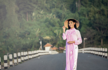 Portrait of Thai girls with Ao Dai, Vietnam traditional dress, Ao dai is famous traditional costume for woman in VIetnam.