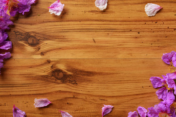 flower frame on wood background