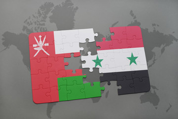 puzzle with the national flag of oman and syria on a world map background.