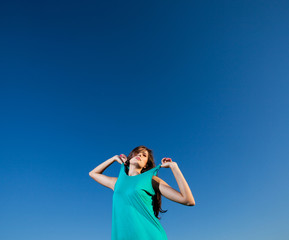 Fototapeta na wymiar Woman in blue dress