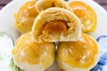 Chinese pastry cake made from flour,bean,egg and sugar on small plate