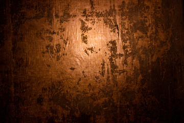 old scary rusty rough golden and copper metal surface texture/background for Halloween or haunted...