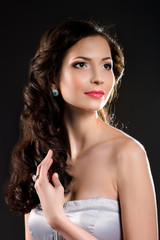 Glamour portrait of young beautiful fashion woman posing in exlu