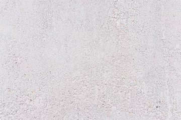 Crackles of paint on the old grey wall.