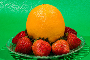 Fototapeta na wymiar Fresh Orange and Strawberries