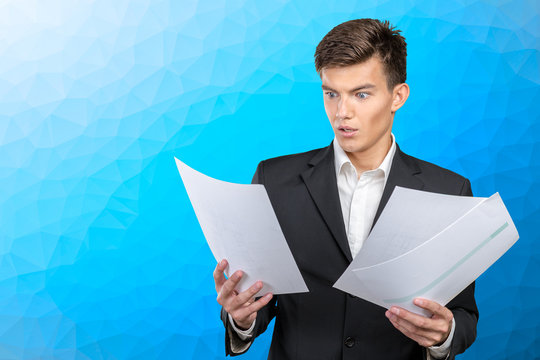 Busy Businessman With Loads Of Paperwork