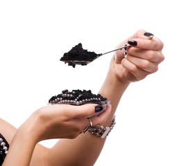 Spoon with black caviar