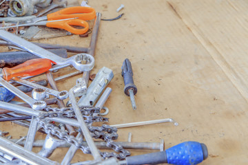 Set of different work tools: screwdriver, Scissors,pliers, chain