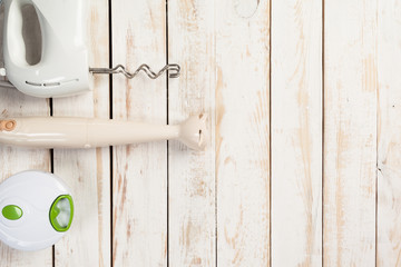 Various kitchen utensils on wooden table