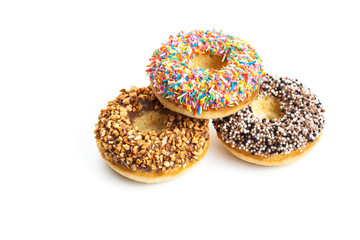 various donuts on white background