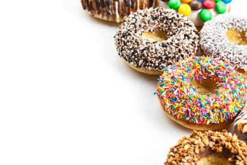 Delicious donuts with icing isolated on white