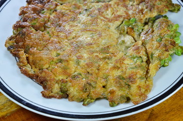 fried egg crispy and fluffy on dish