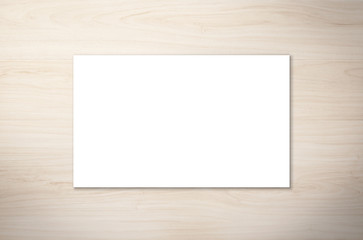 white blank name card on wooden background