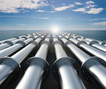 metal pipeline with blue sea and blue sky background