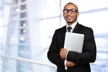 Fototapeta premium black business man with laptop