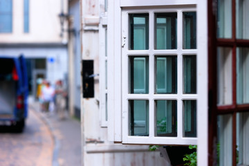 Opening doors and windows in the old town of Riga