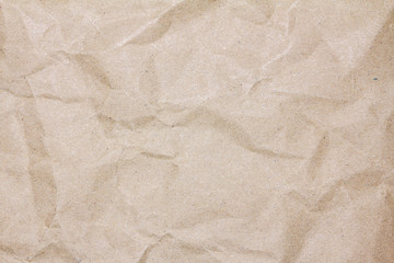 Closeup brown recycled crumpled paper texture or brown recycled crumpled paper background for design with copy space for text or image.