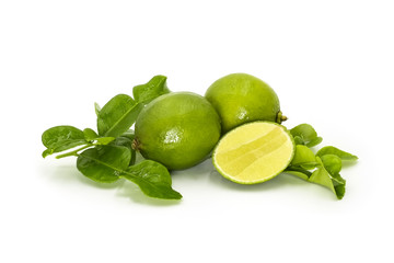 Kaffir leaves, limes on white backround. ingredients for making Thai food