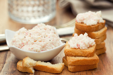 seafood pate with toasts and glass of water