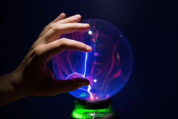 finger on the plasma ball, ball of light Tesla.