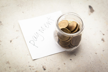 Money jar with coins