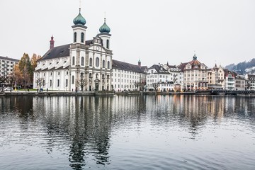 Obraz premium Holiday in Europe - Beautiful foggy view of winter landscape in Lucerne, Switzerland