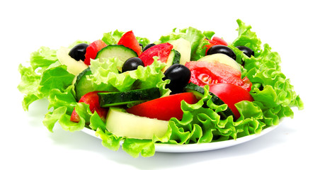 Fresh vegetable salad isolated on a white