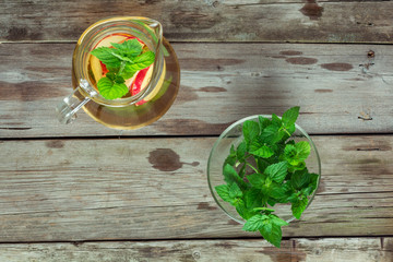 Decanter cool green tea with apples and mint