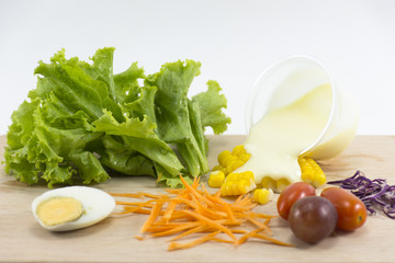 Vegetable and fruit salad on block isolated on white background.Food organic and menu for health.