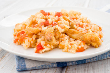 approach making rice dish with cod