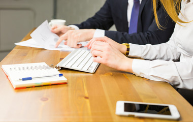 Close-up of male and female office workers.