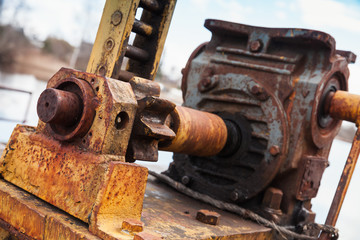 Old rusted engine with gears, close-up photo