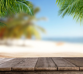 Empty wooden planks with blur beach on background