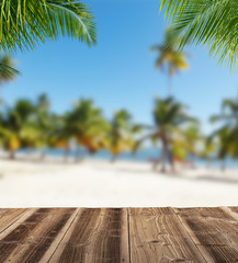 Empty wooden planks with blur beach on background