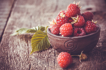 Fresh raspberry on a wooden table