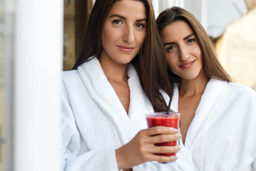 Detox Diet. Healthy Women Drinking Fresh Juice, Smoothie Indoors