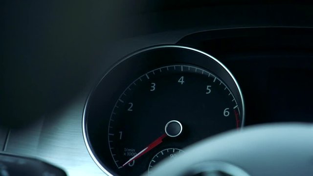 Slowmotion view on speedometer in car