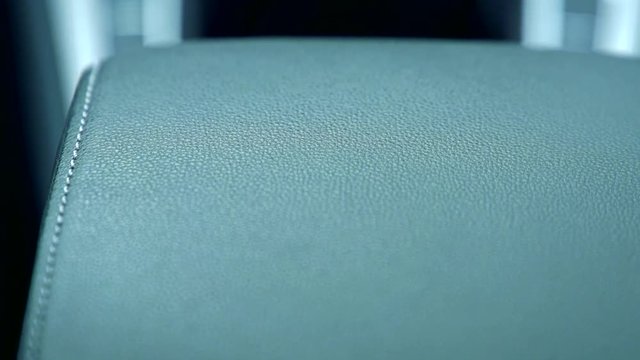 Slowmotion detail view on seat in car