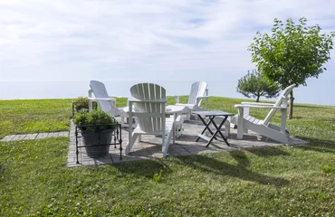 Afwasbaar fotobehang White Adirondack Chairs by Lake Erie © chiyacat