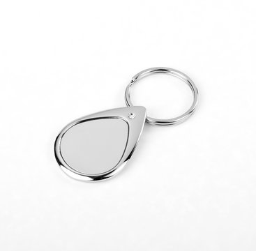 Silver Key Chain With Chain And Rings On White Background