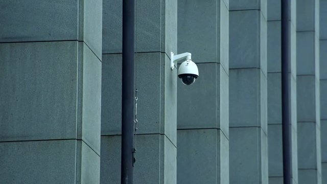 Slowmotion view on light on wall of house