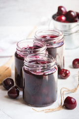 Jars with freshly homemade cherry jam