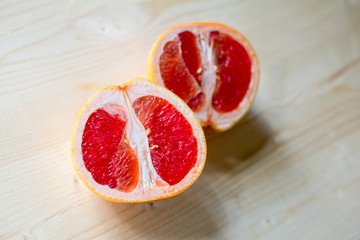 Grapefruit on wooden cutting Board