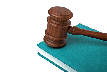 Wooden mallet and book on a white background