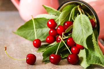 ripe red cherry on wooden background. delicious