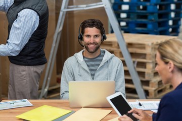 Smiling worker looking at camera