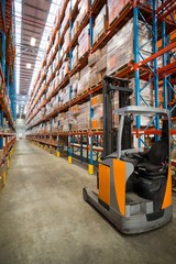 Forklift truck in warehouse © WavebreakMediaMicro